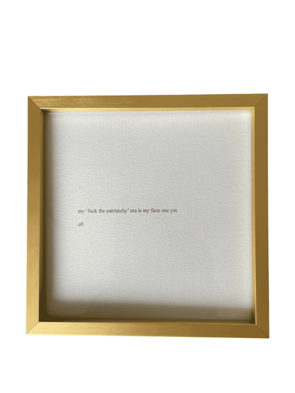 Framed print of the politically-forward piece 'Era of Fire' by writer, poet and intuitive practitioner Aliesha Bannister.