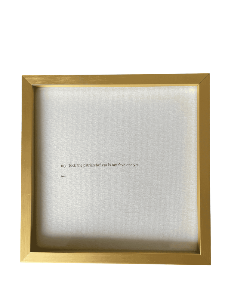 Framed print of the politically-forward piece 'Era of Fire' by writer, poet and intuitive practitioner Aliesha Bannister.