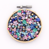 Depth in Trusting, small mixed media textile artwork by Samira Stephens with layered beadwork creating visual depth.